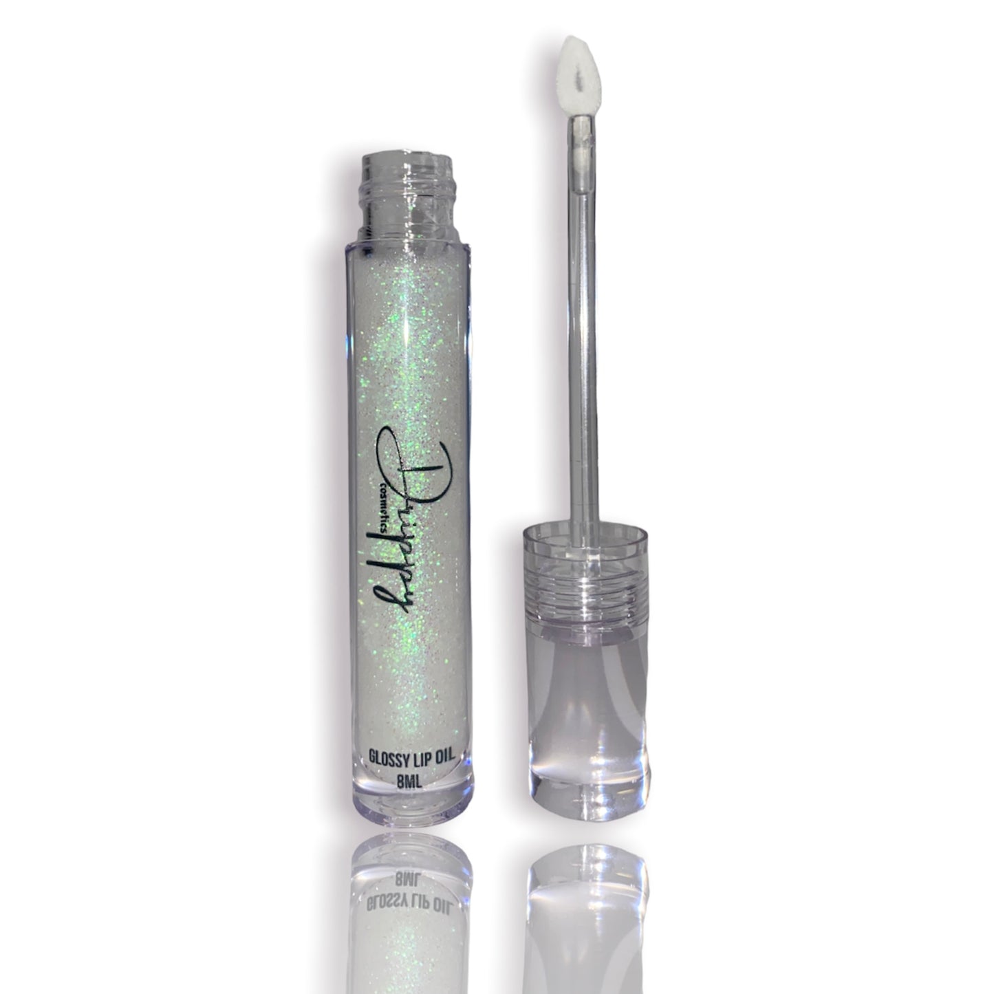 DRIPPY COSMETICSCoconut Sparkle Glossy Lip Oil
Not as thin as a lip oil & not as thick and sticky as a Lip gloss.
Our light-weight, silky formula gives you the shine of a Lip gloss with less stickiness and