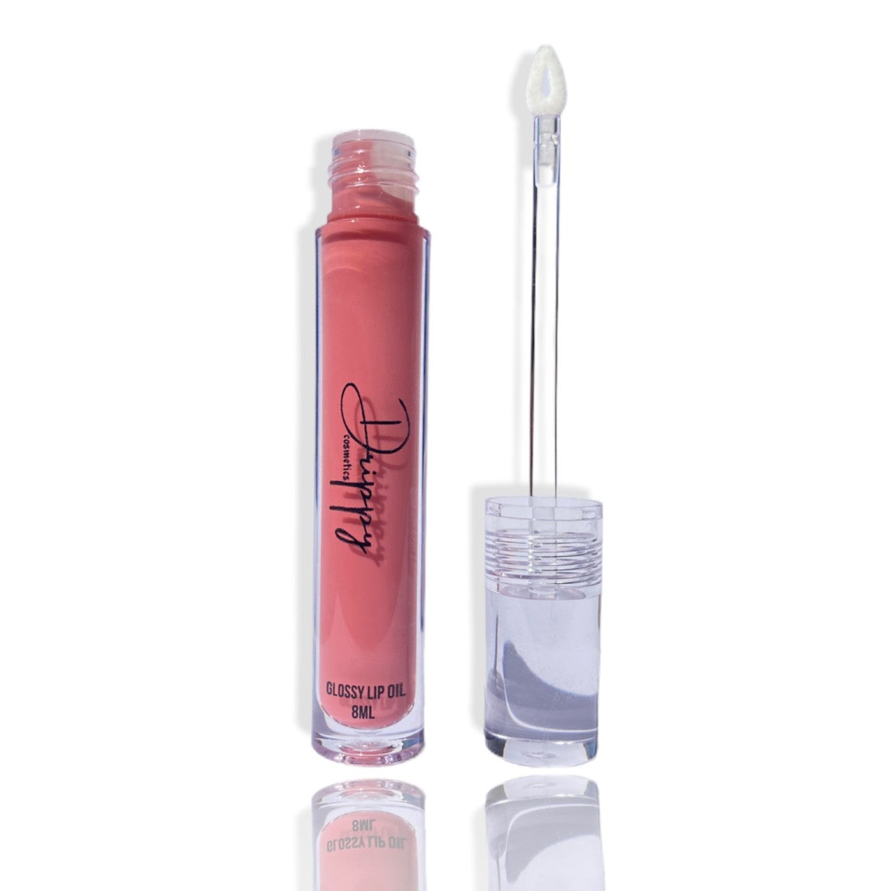 DRIPPY COSMETICSBlush Glossy Lip OilNot as thin as a lip oil & not as thick and sticky as a Lip gloss.
Our light-weight, silky formula gives you the shine of a Lip gloss with less stickiness and m
