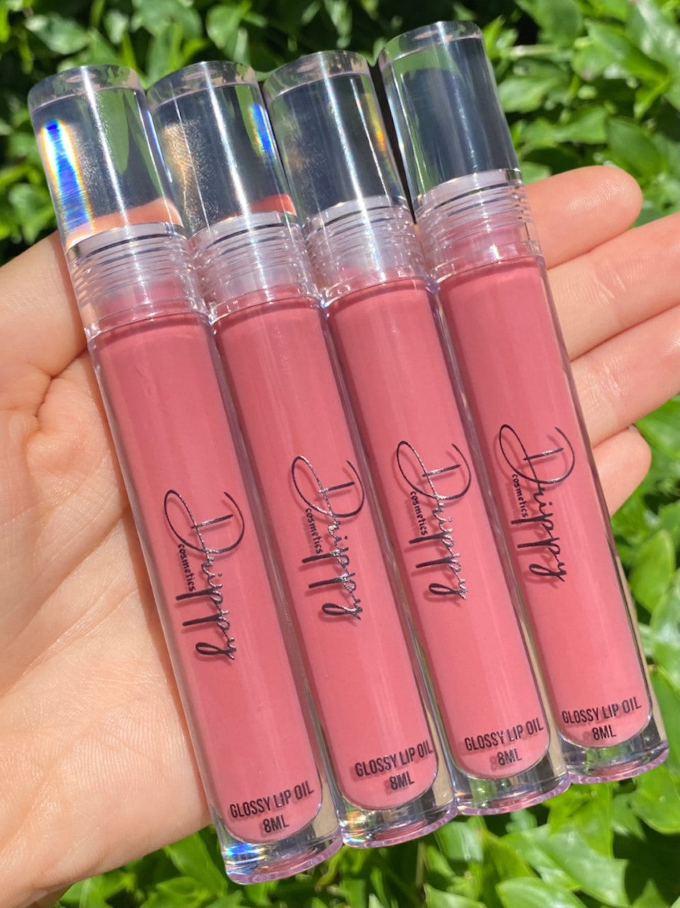 DRIPPY COSMETICSBlush Glossy Lip OilNot as thin as a lip oil & not as thick and sticky as a Lip gloss.
Our light-weight, silky formula gives you the shine of a Lip gloss with less stickiness and m