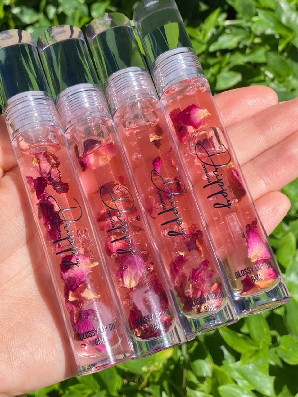 DRIPPY COSMETICSKiss From A Rose Glossy Lip Oil Associated with Aphrodite (or Venus in the Roman tradition) Goddess of Love, Beauty, and Fertility, the rose represents love in all aspects and the ability to see b