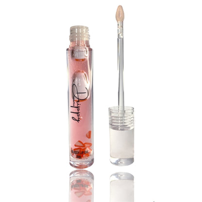 DRIPPY COSMETICSJuicy Strawberry Glossy Lip Oil
Not as thin as a lip oil &amp; not as thick and sticky as a Lip gloss. 
Our light-weight, silky formula gives you the shine of a Lip gloss with less stickiness and 