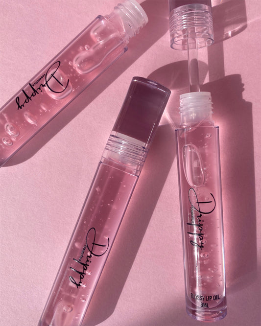 DRIPPY COSMETICSWatermelon Glossy Lip OilNot as thin as a lip oil &amp; not as thick and sticky as a Lip gloss. 
Our light-weight, silky formula gives you the shine of a Lip gloss with less stickiness and m