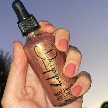 DRIPPY COSMETICSGlow DropsA luxurious blend of rich oils formulated to give you glowing, hydrated &amp; sun kissed skin. Massage all over your body for a goddess like glow. 
This oil penetrat