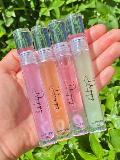 DRIPPY COSMETICSWatermelon Glossy Lip OilNot as thin as a lip oil &amp; not as thick and sticky as a Lip gloss. 
Our light-weight, silky formula gives you the shine of a Lip gloss with less stickiness and m