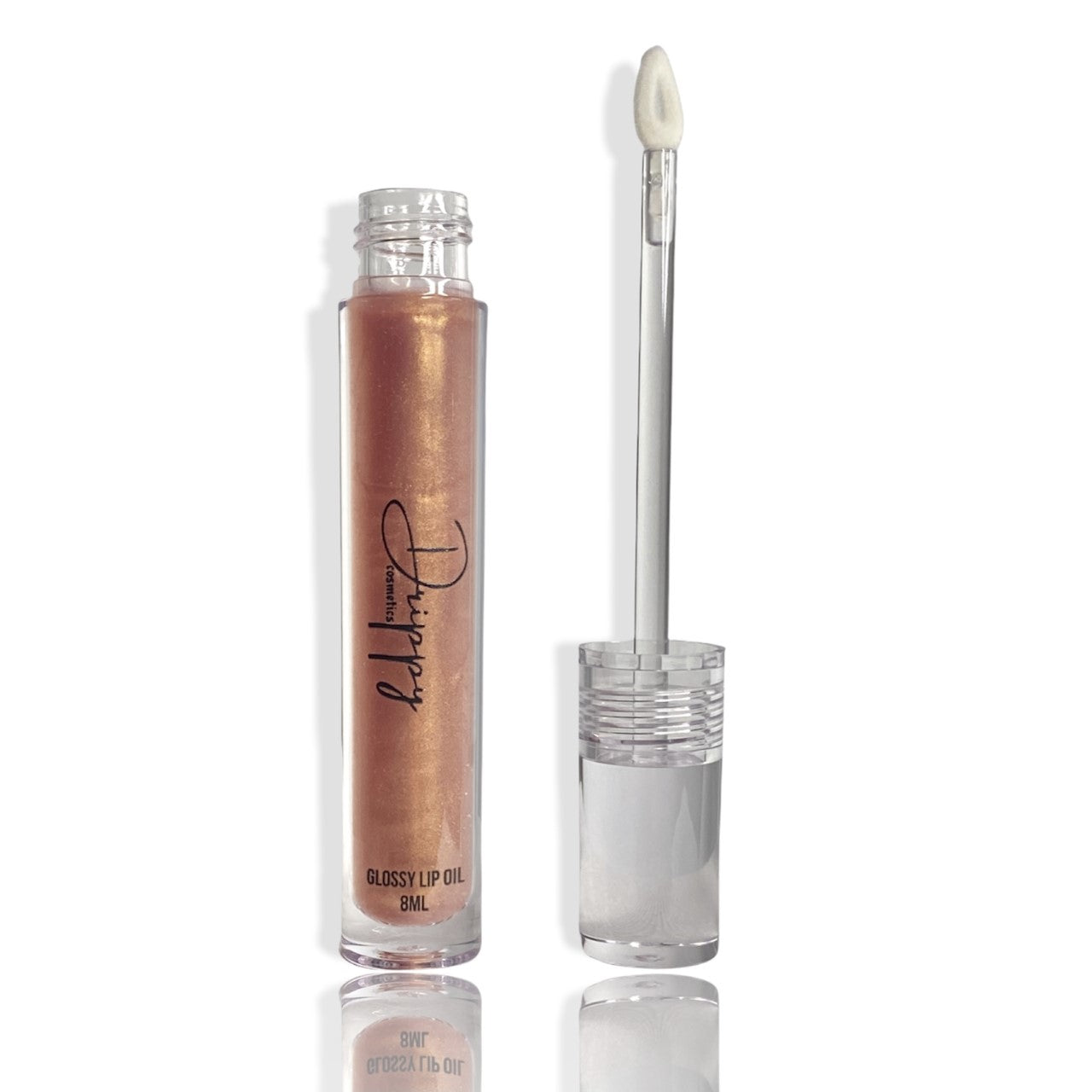 DRIPPY COSMETICSGolden Hour Glossy Lip OilNot as thin as a lip oil &amp; not as thick and sticky as a Lip gloss. 
Our light-weight, silky formula gives you the shine of a Lip gloss with less stickiness and m