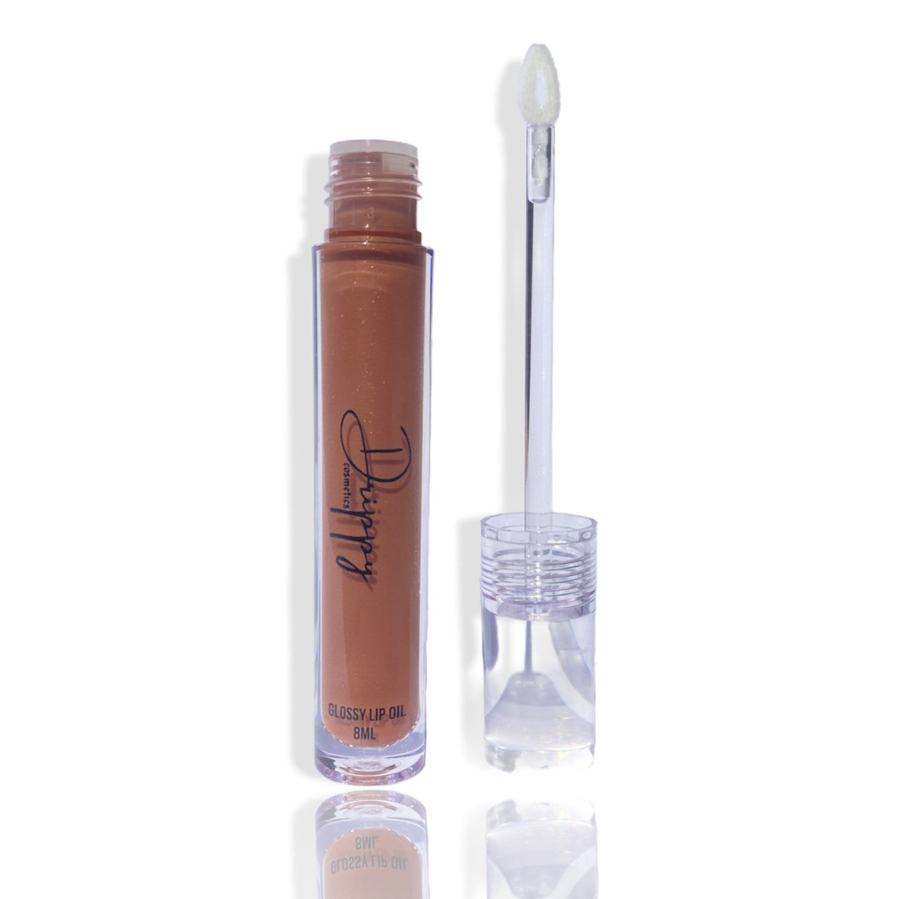 DRIPPY COSMETICSSahara Glossy Lip OilNot as thin as a lip oil &amp; not as thick and sticky as a Lip gloss. 
Our light-weight, silky formula gives you the shine of a Lip gloss with less stickiness and m